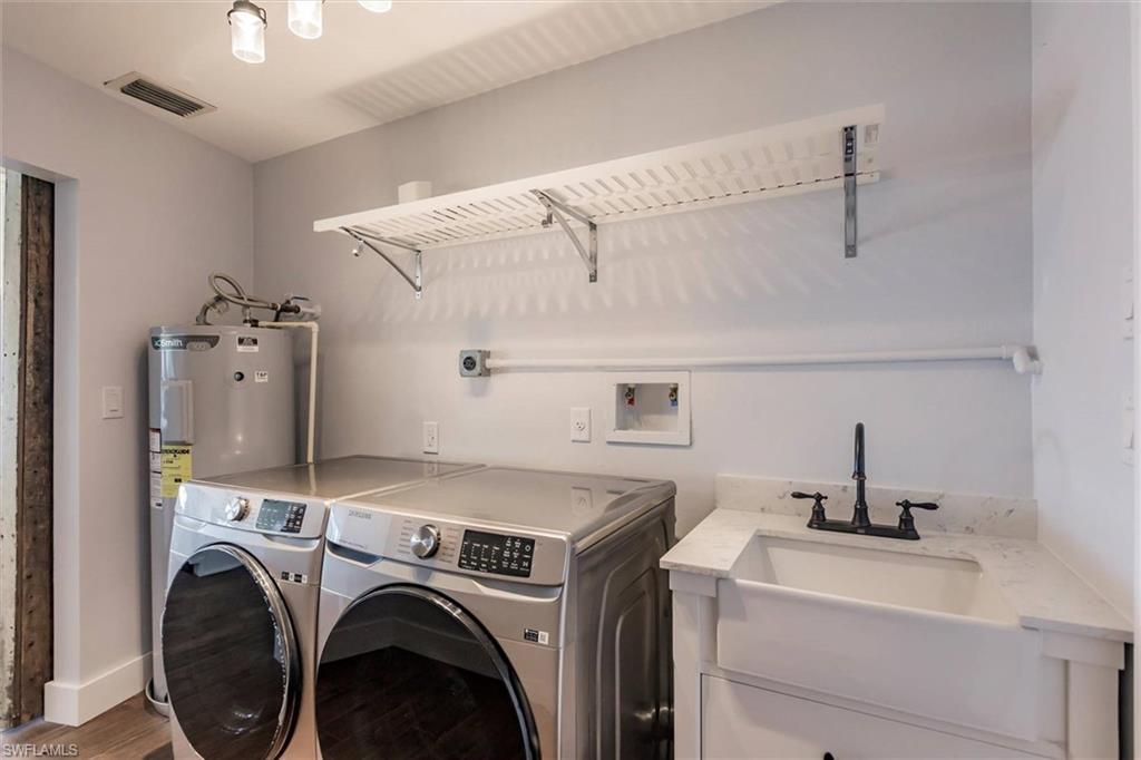 138 Riverview Road Fort Myers, FL 33905 - Photo 38 of 50 a utility room with dryer and washer