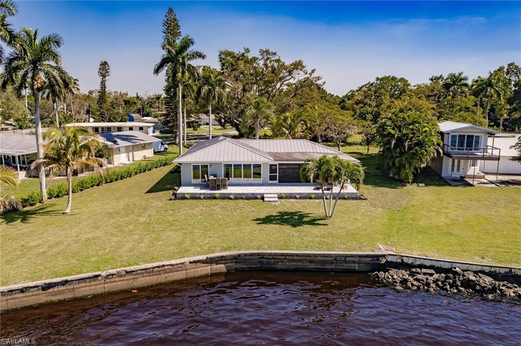 138 Riverview Road Fort Myers, FL 33905 - Photo 42 of 50 a front view of a house with swimming pool