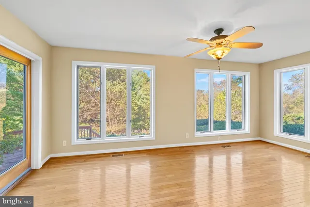 a reading room with furniture and book shelf