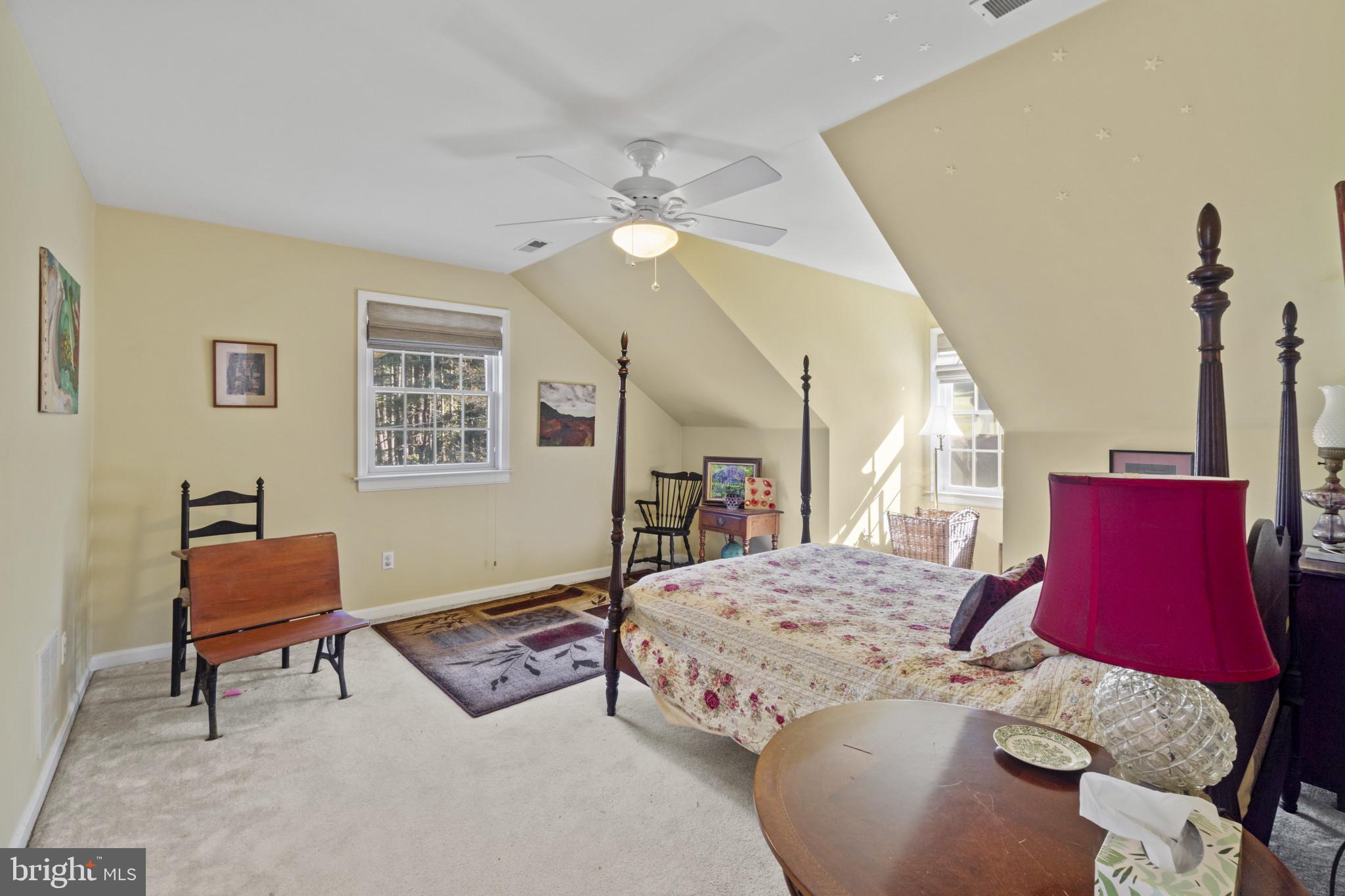 1326 Bernoudy Road White Hall, MD 21161 - Photo 16 of 32 a bedroom with furniture and a chandelier