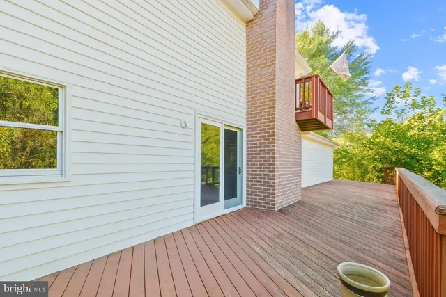 a view of a house with a tree