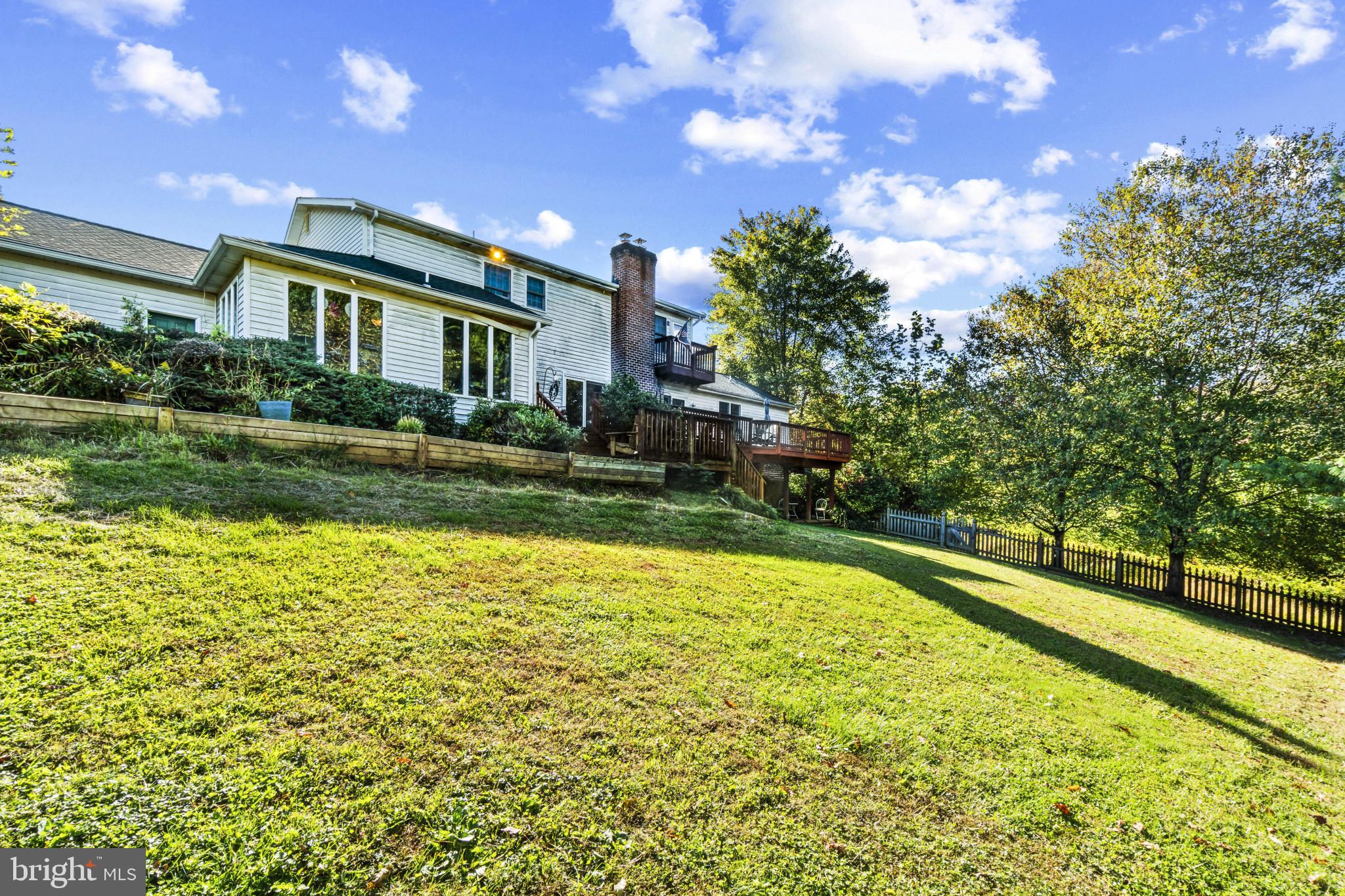 1326 Bernoudy Road White Hall, MD 21161 - Photo 25 of 32 a view of an house with swimming pool and a yard