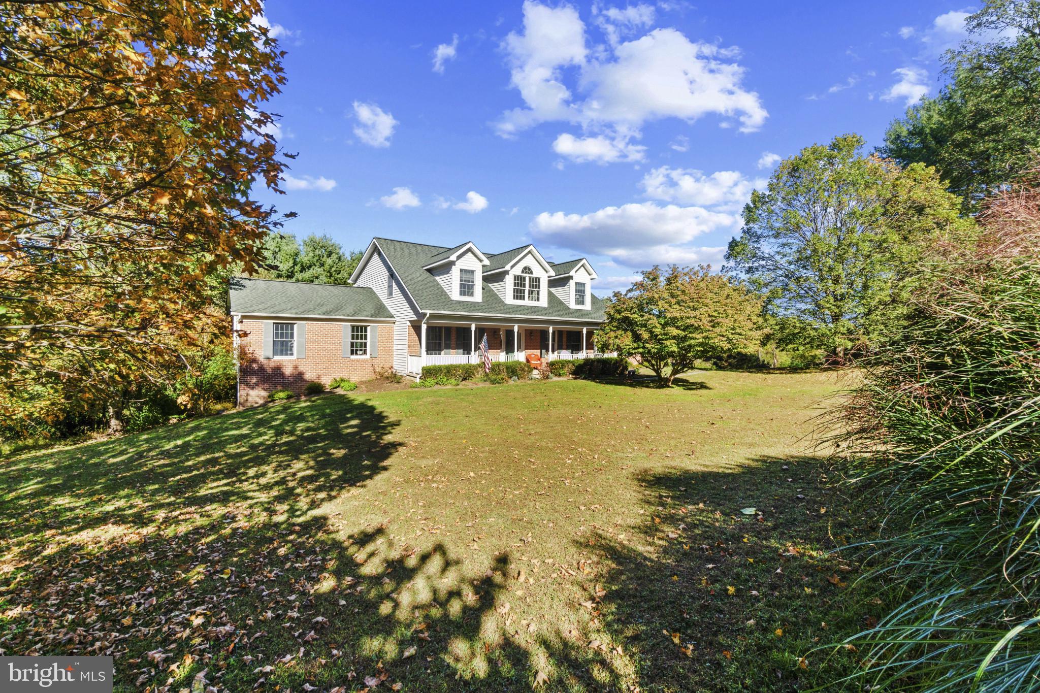 1326 Bernoudy Road White Hall, MD 21161 - Photo 3 of 32 a front view of a house with a yard