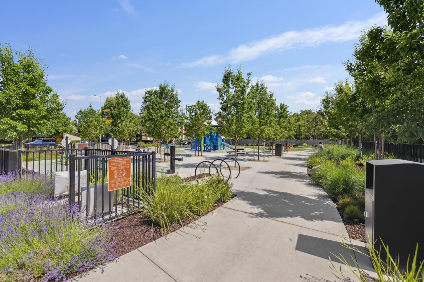 2266 Mora Place Mountain View, CA 94040 - Photo 29 of 32 a view of a lake with a bench next to a lake