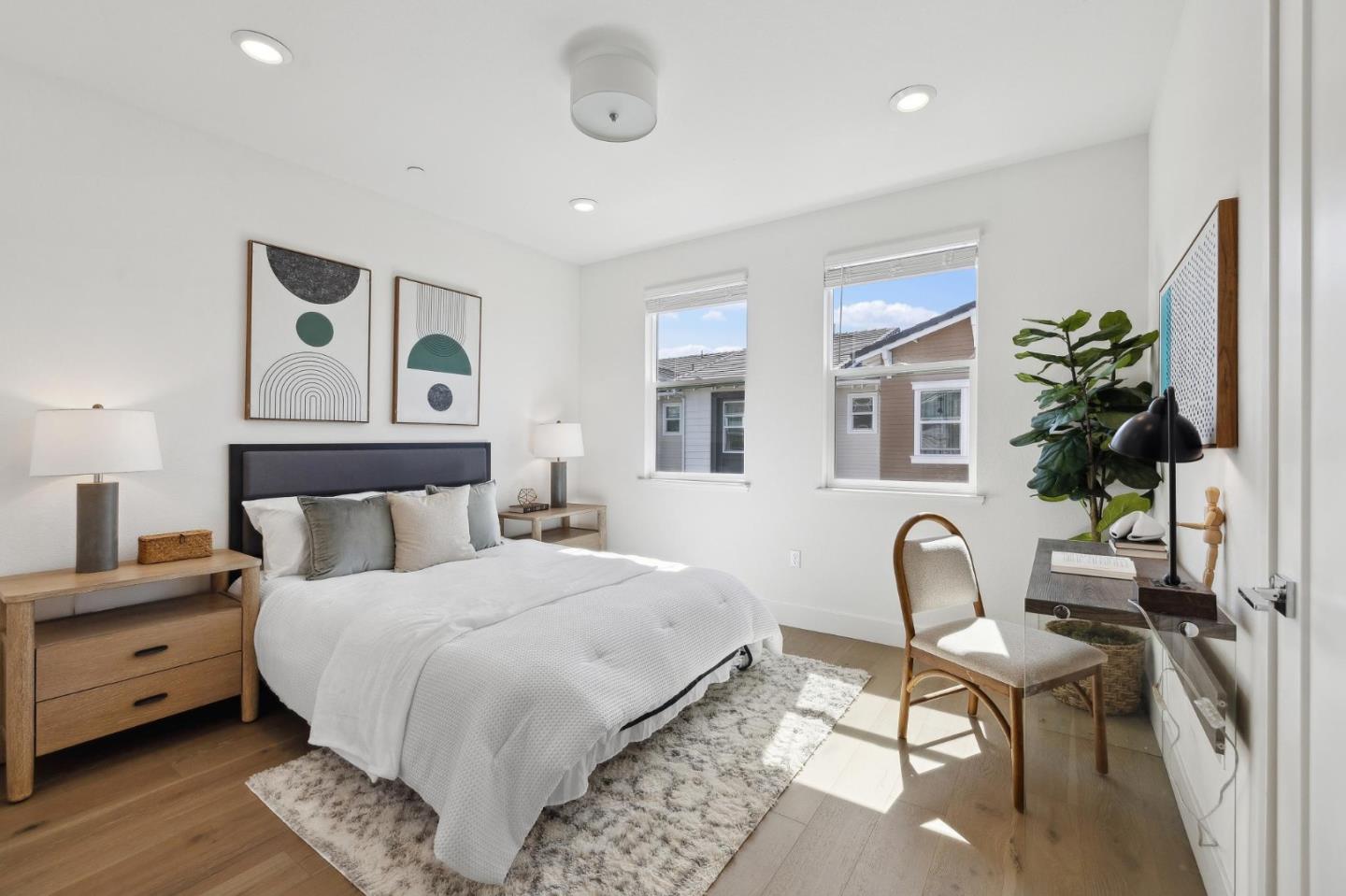 2266 Mora Place Mountain View, CA 94040 - Photo 6 of 32 a bedroom with a bed and wooden floor