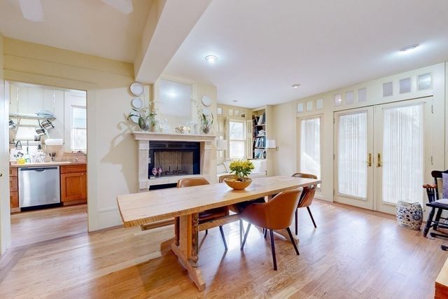a workspace with furniture window and wooden floor
