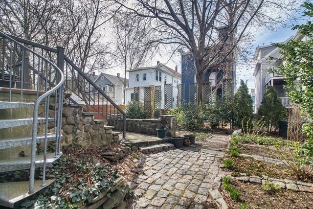 a view of a pathway with a yard