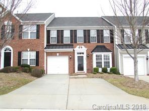 149 Snead Road, Unit 70 Fort Mill, SC 29715 - Photo 1 of 15 a front view of a house with a yard and garage
