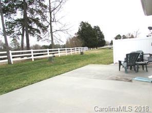 149 Snead Road, Unit 70 Fort Mill, SC 29715 - Photo 2 of 15 a view of a swimming pool and a yard