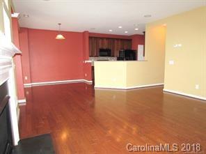 149 Snead Road, Unit 70 Fort Mill, SC 29715 - Photo 7 of 15 a view of a kitchen with a microwave and a refrigerator