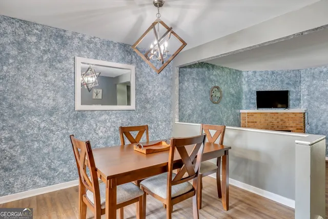 a patio with a table and chairs