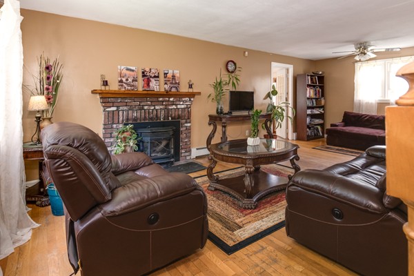 11 Glenmere Road Charlton, MA 01507 - Photo 13 of 30 a living room with furniture and a fireplace