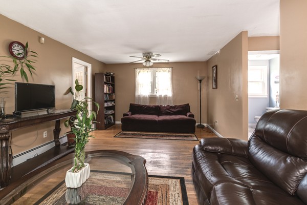 11 Glenmere Road Charlton, MA 01507 - Photo 14 of 30 a living room with furniture and a flat screen tv