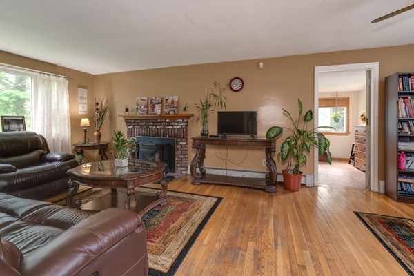 11 Glenmere Road Charlton, MA 01507 - Photo 16 of 30 a living room with furniture and a fireplace