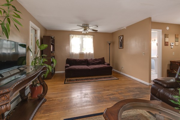 11 Glenmere Road Charlton, MA 01507 - Photo 17 of 30 a living room with furniture and a flat screen tv