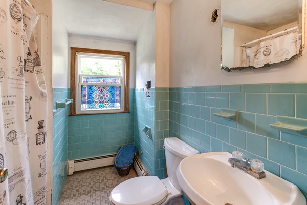 11 Glenmere Road Charlton, MA 01507 - Photo 23 of 30 a bathroom with a toilet sink and mirror