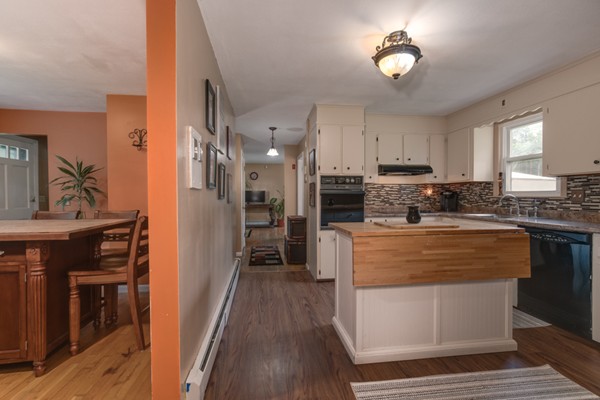 11 Glenmere Road Charlton, MA 01507 - Photo 6 of 30 a kitchen with stainless steel appliances granite countertop a stove refrigerator and cabinets