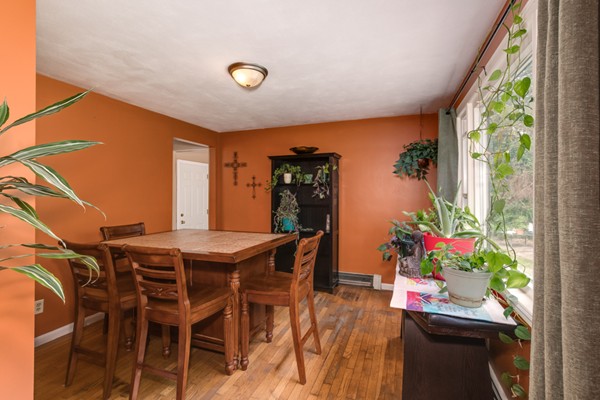 11 Glenmere Road Charlton, MA 01507 - Photo 8 of 30 a view of a dining room with furniture and a potted plant