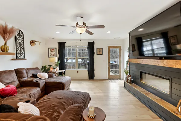 a bedroom with a bed and flat screen tv