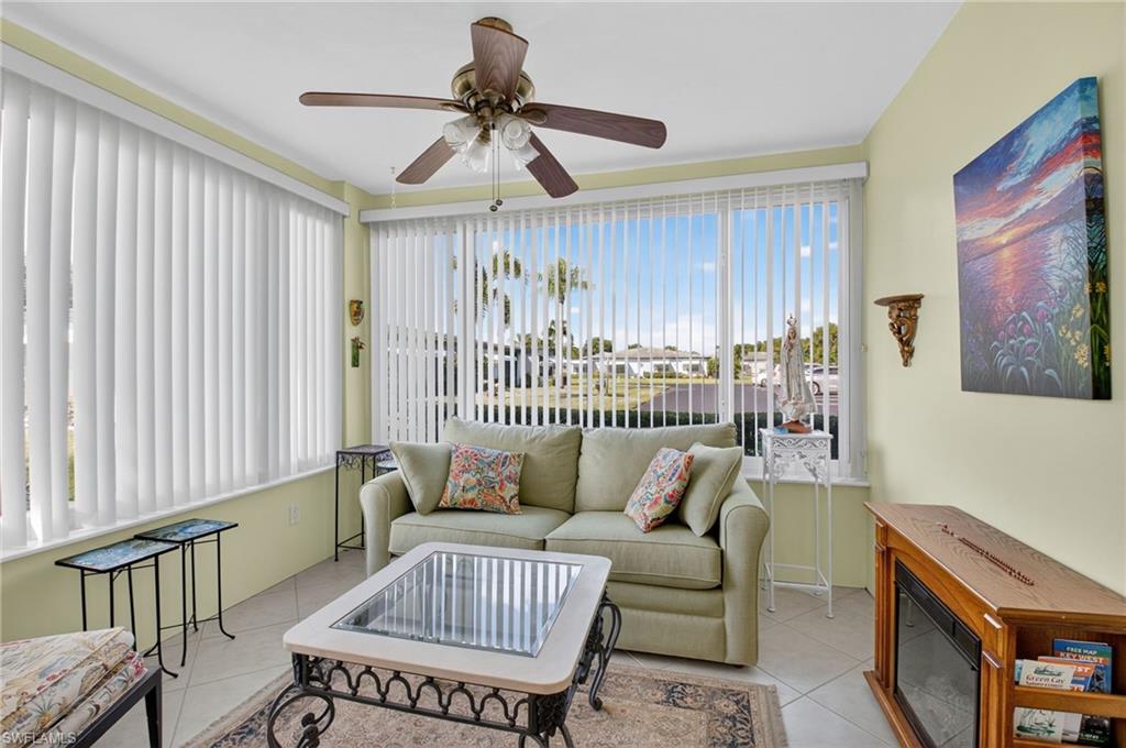 572 High Point Drive, Unit D Delray Beach, FL 33445 - Photo 17 of 21 a living room with furniture and a window