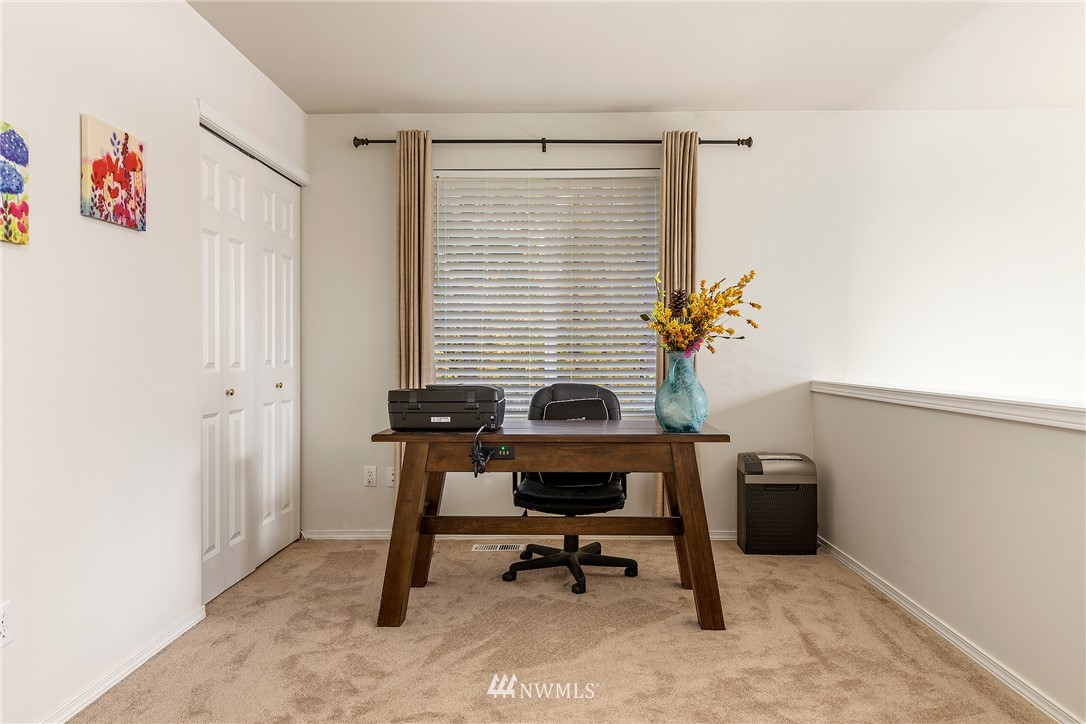 3136 Northeast 20th Place Renton, WA 98056 - Photo 15 of 29 a view of a workspace with furniture and a window