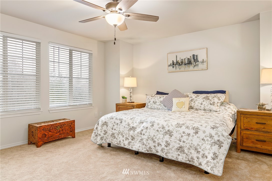 3136 Northeast 20th Place Renton, WA 98056 - Photo 17 of 29 a bedroom with a bed and a window