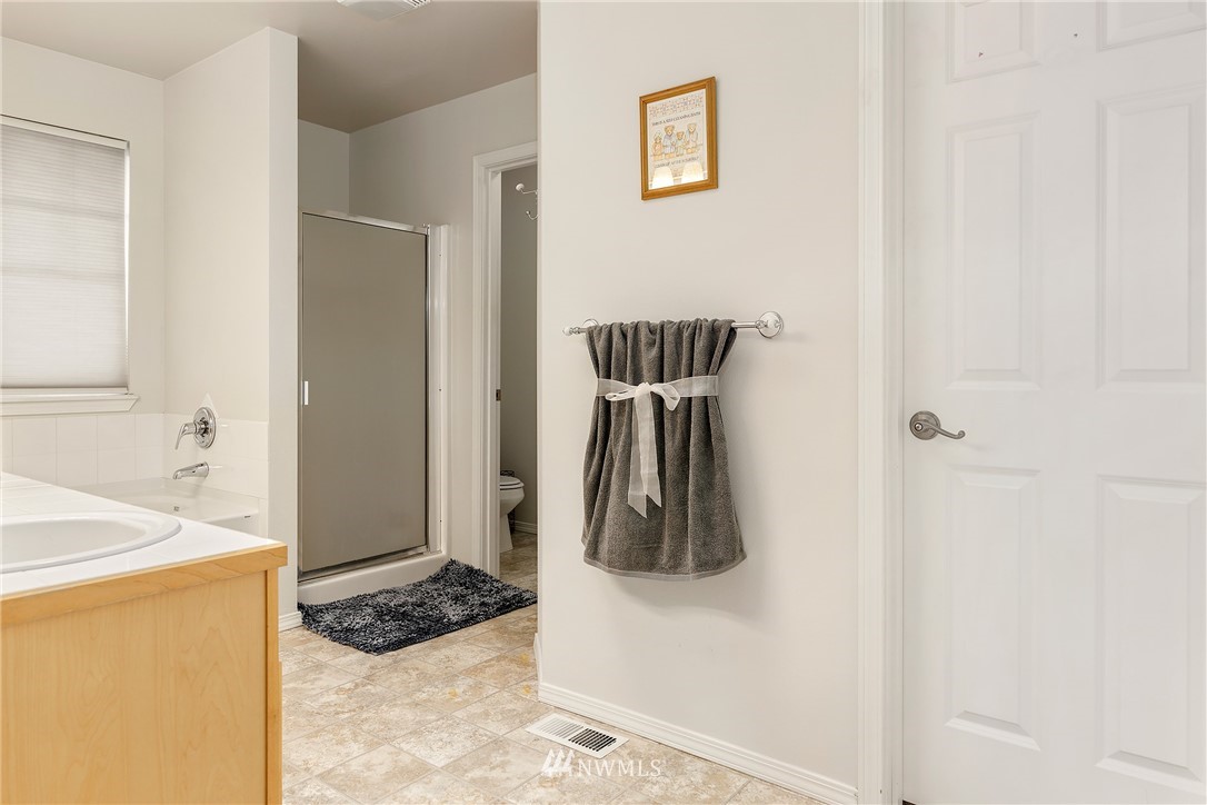 3136 Northeast 20th Place Renton, WA 98056 - Photo 20 of 29 a walk in closet and view of bathroom