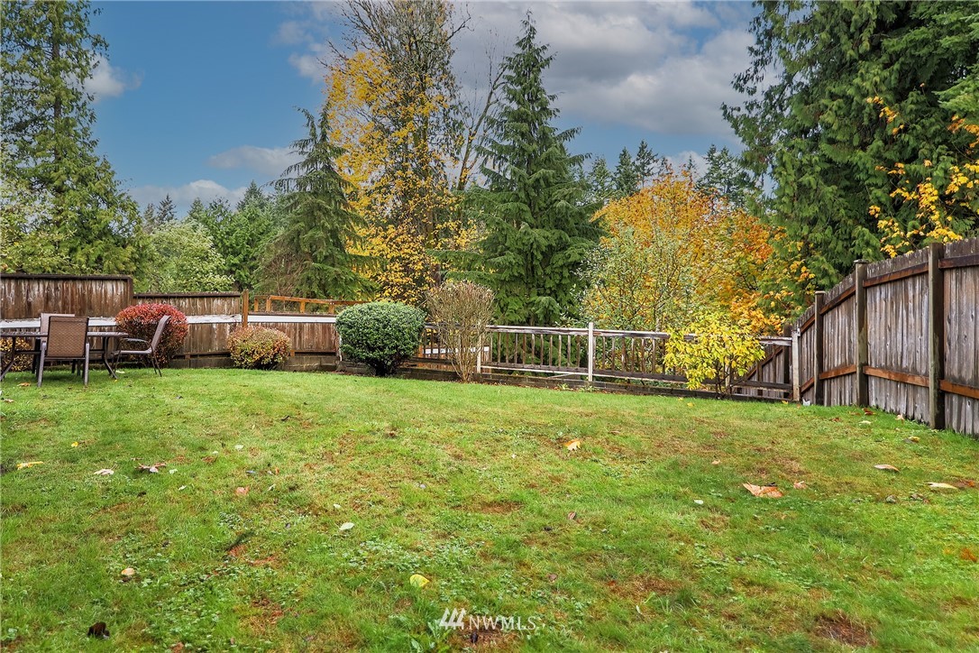 3136 Northeast 20th Place Renton, WA 98056 - Photo 27 of 29 a view of a backyard with a garden