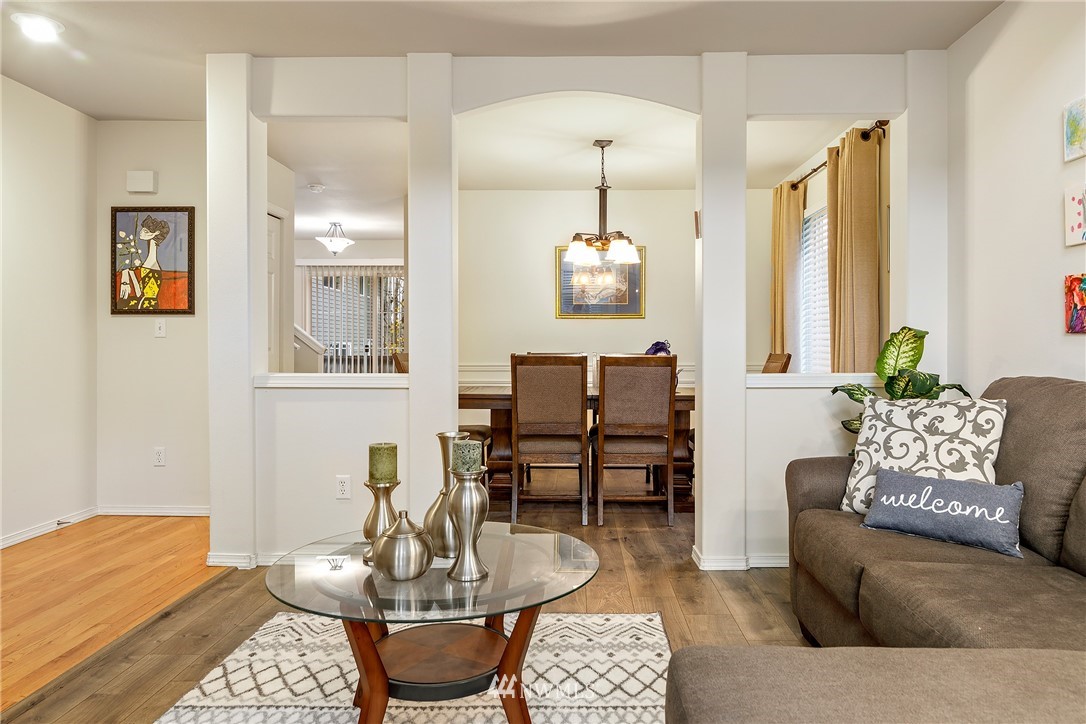 3136 Northeast 20th Place Renton, WA 98056 - Photo 5 of 29 a living room with furniture kitchen and a table