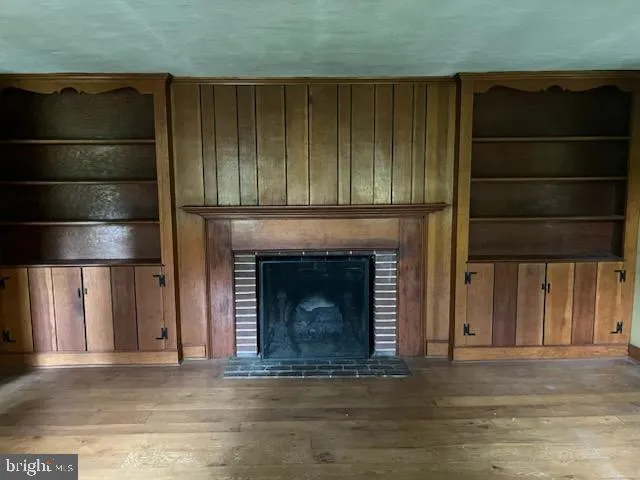 a living room with a fireplace