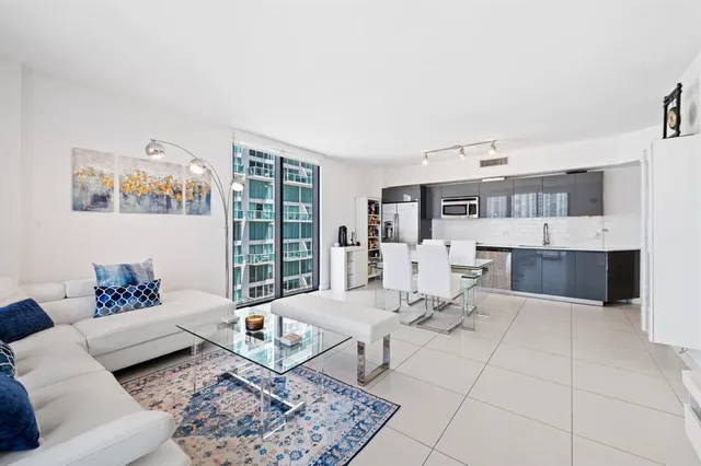 a living room with furniture and a couch