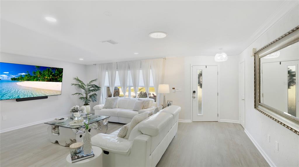 6726 South Lockwood Ridge Road Sarasota, FL 34231 - Photo 13 of 36 a living room with furniture