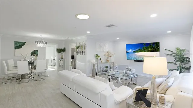 a living room with furniture and a table