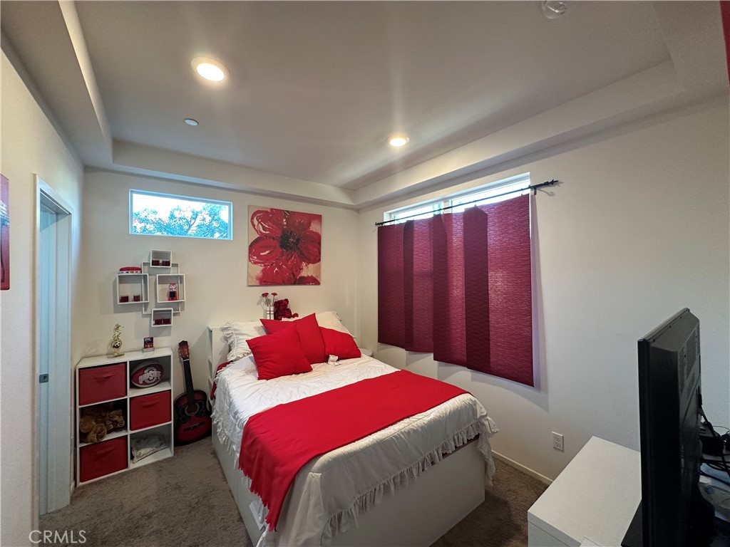 17612 Garden House Lane Bellflower, CA 90706 - Photo 20 of 31 a bedroom with a bed and a closet