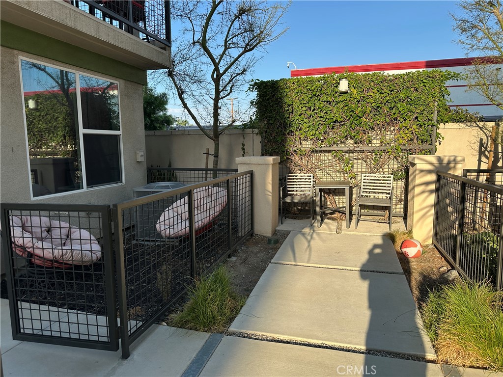 17612 Garden House Lane Bellflower, CA 90706 - Photo 21 of 31 a view of a balcony with chairs
