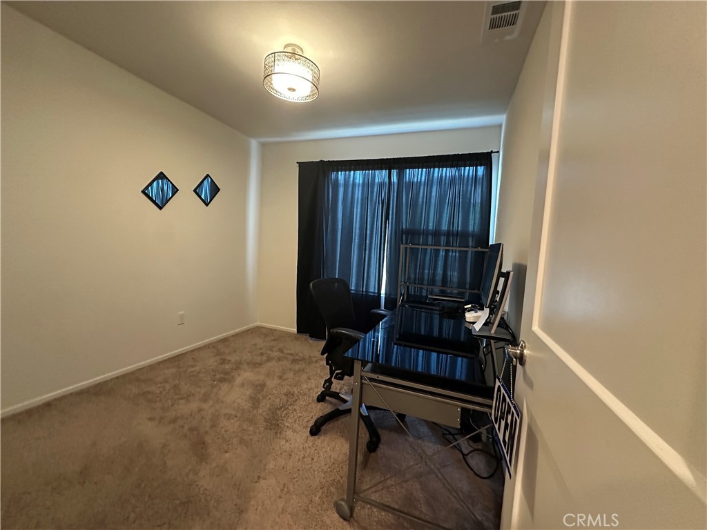 17612 Garden House Lane Bellflower, CA 90706 - Photo 9 of 31 a view of workspace