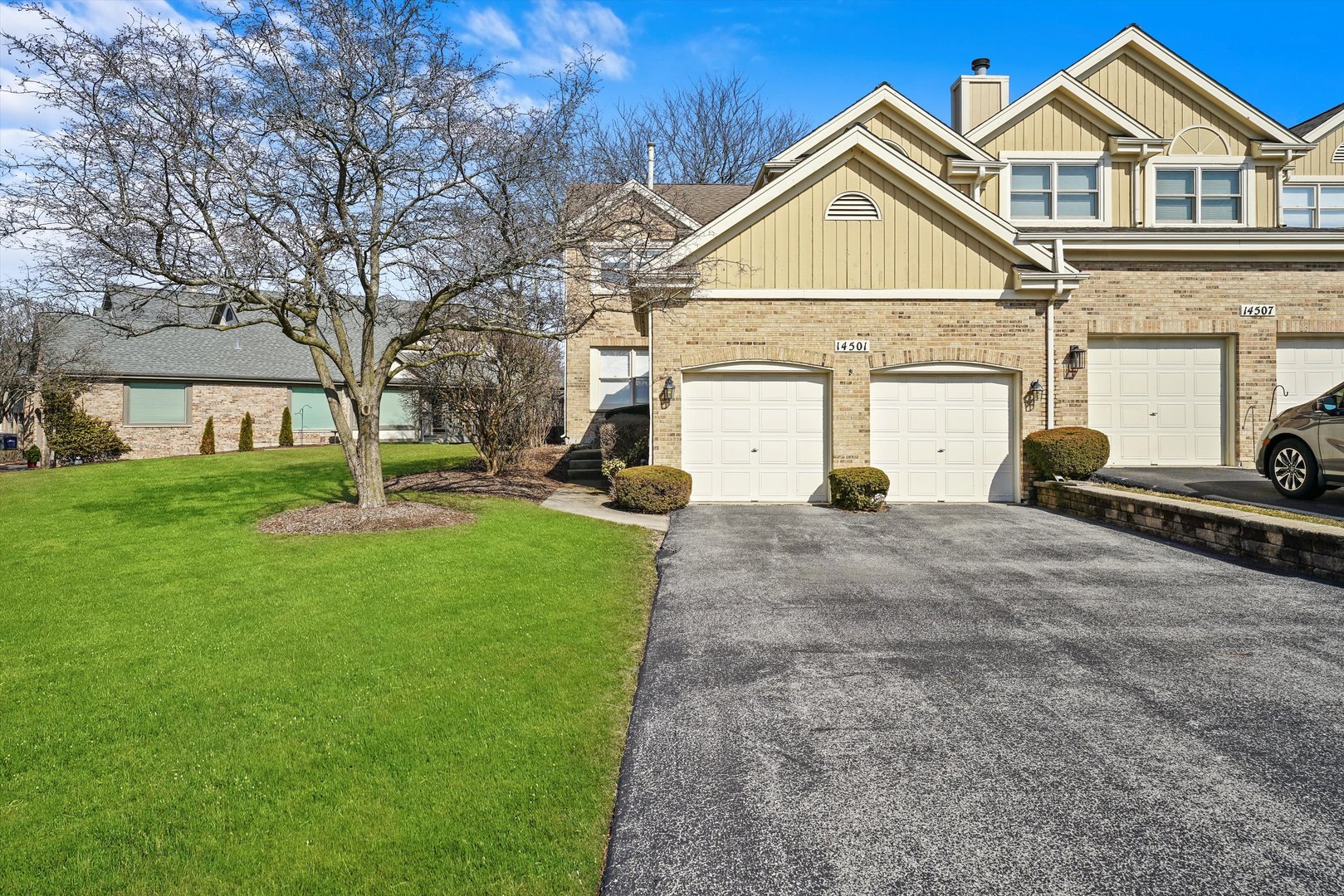 14501 Golf Road Orland Park, IL 60462 - Photo 1 of 53 a front view of a house with a yard and trees