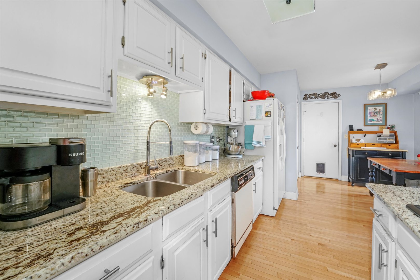14501 Golf Road Orland Park, IL 60462 - Photo 13 of 53 a kitchen with stainless steel appliances granite countertop a sink stove and refrigerator