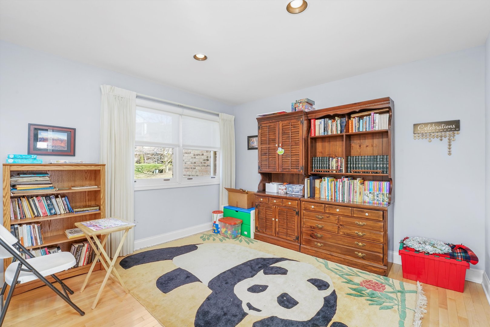 14501 Golf Road Orland Park, IL 60462 - Photo 21 of 53 a bedroom with furniture and a book shelf