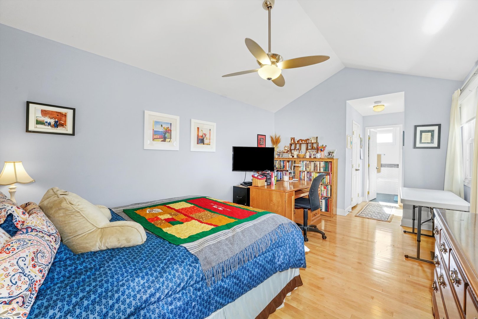 14501 Golf Road Orland Park, IL 60462 - Photo 23 of 53 a bedroom with a bed and a flat screen tv