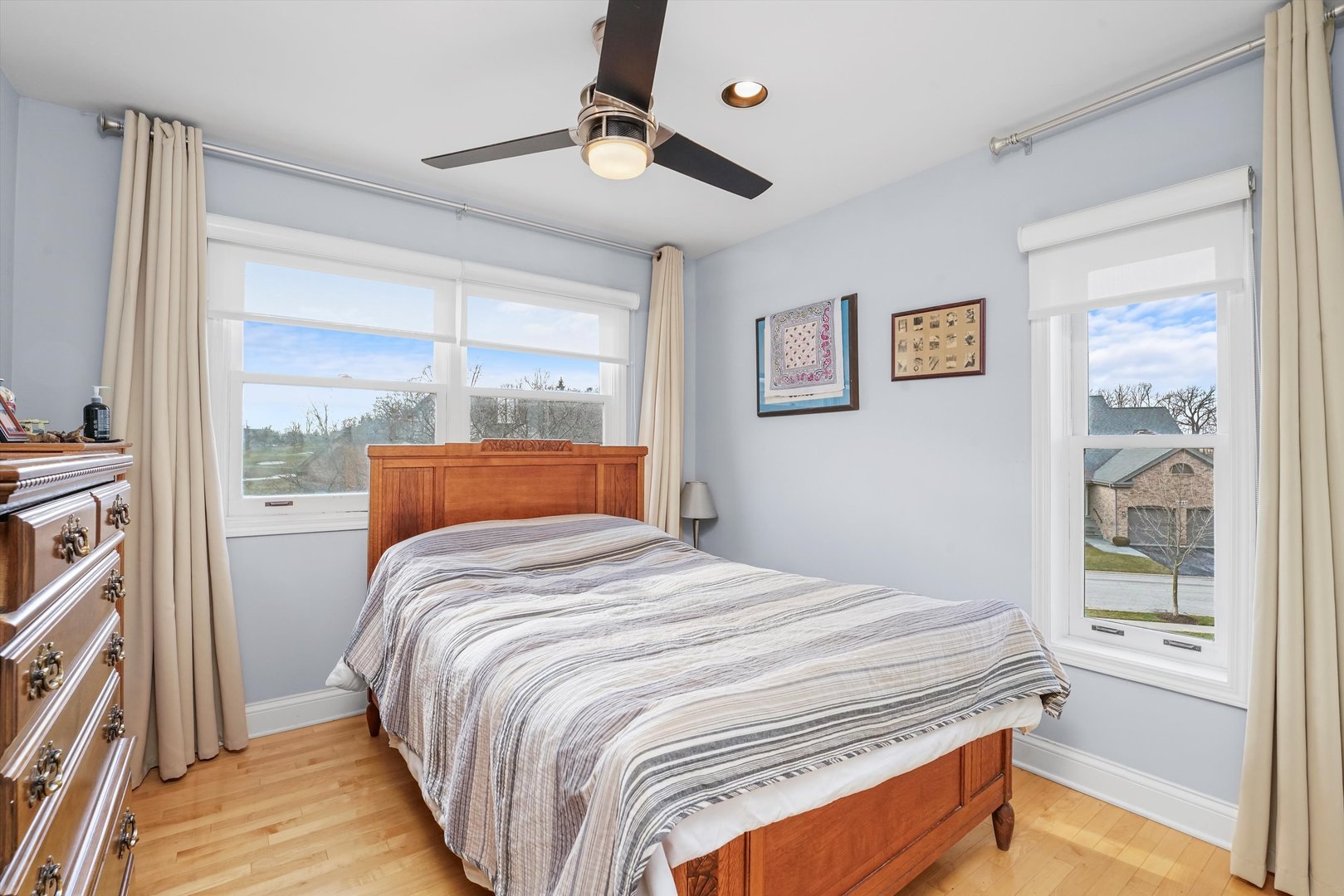 14501 Golf Road Orland Park, IL 60462 - Photo 29 of 53 a bedroom with a bed and a window