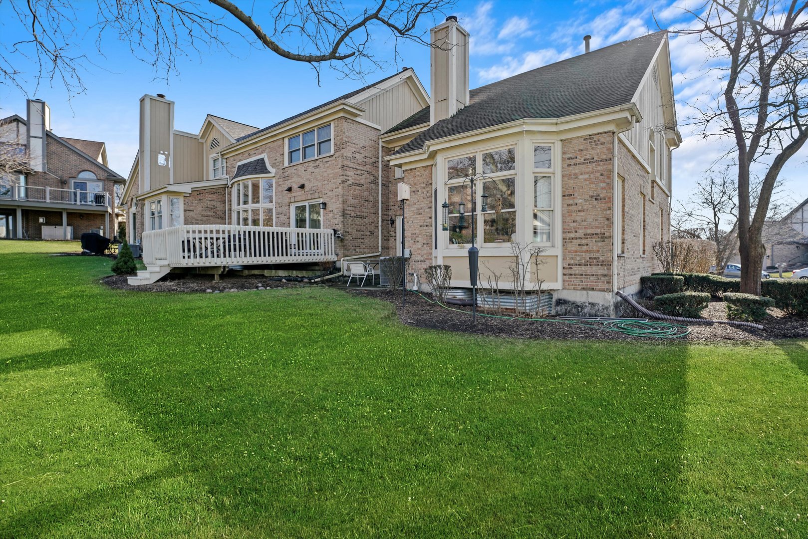 14501 Golf Road Orland Park, IL 60462 - Photo 52 of 53 a view of a house with a yard and sitting area