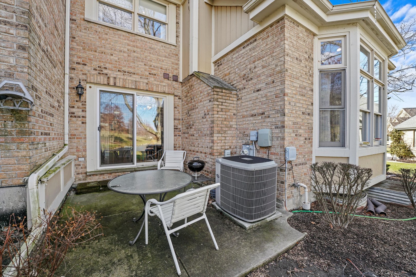 14501 Golf Road Orland Park, IL 60462 - Photo 53 of 53 a view of a patio with table and chairs