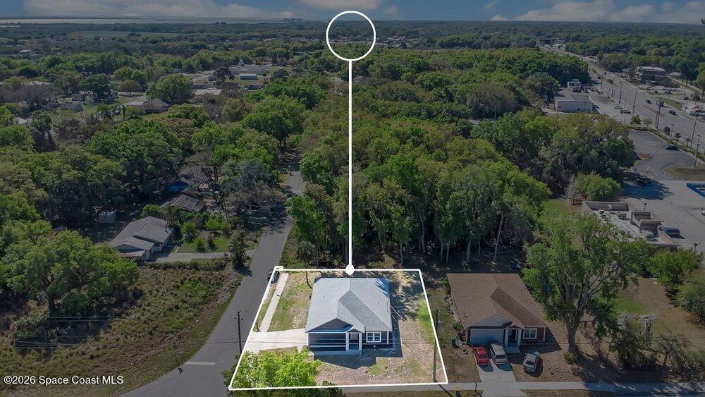 2498 Mitchell Avenue Mims, FL 32754 - Photo 30 of 31 a view of house with outdoor space