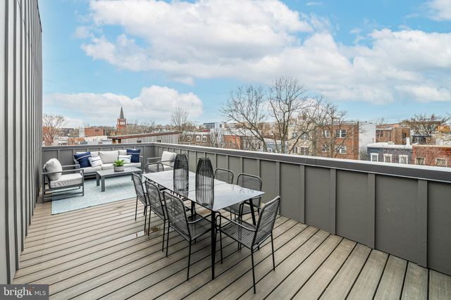 a view of a terrace with seating area