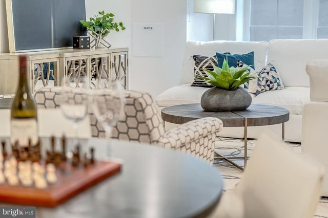a vase of flowers sitting on a table