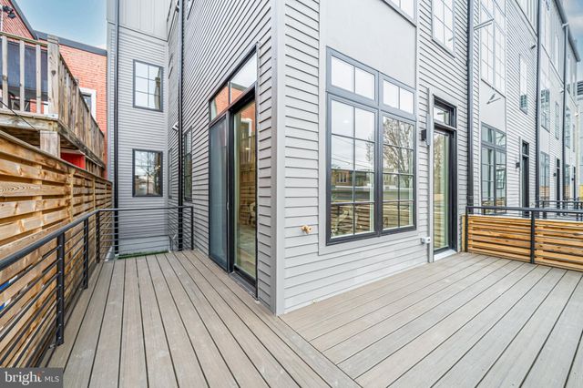 a view of a house with a wooden floor