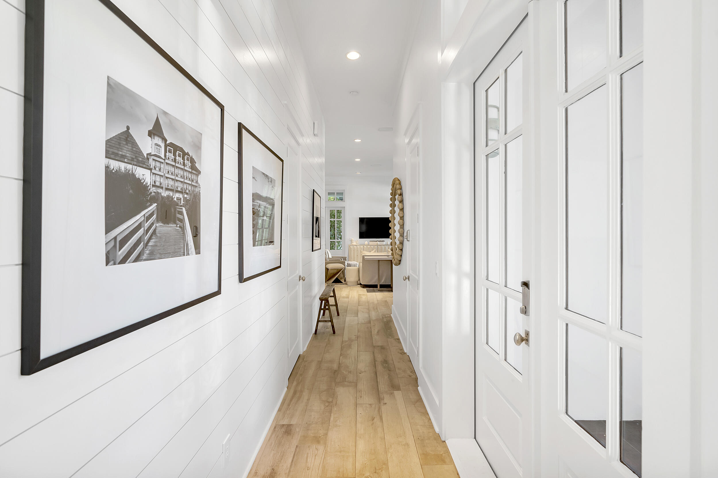 132 Kingston Road Rosemary Beach, FL 32461 - Photo 19 of 70 a view of a hallway with wooden floor and staircase