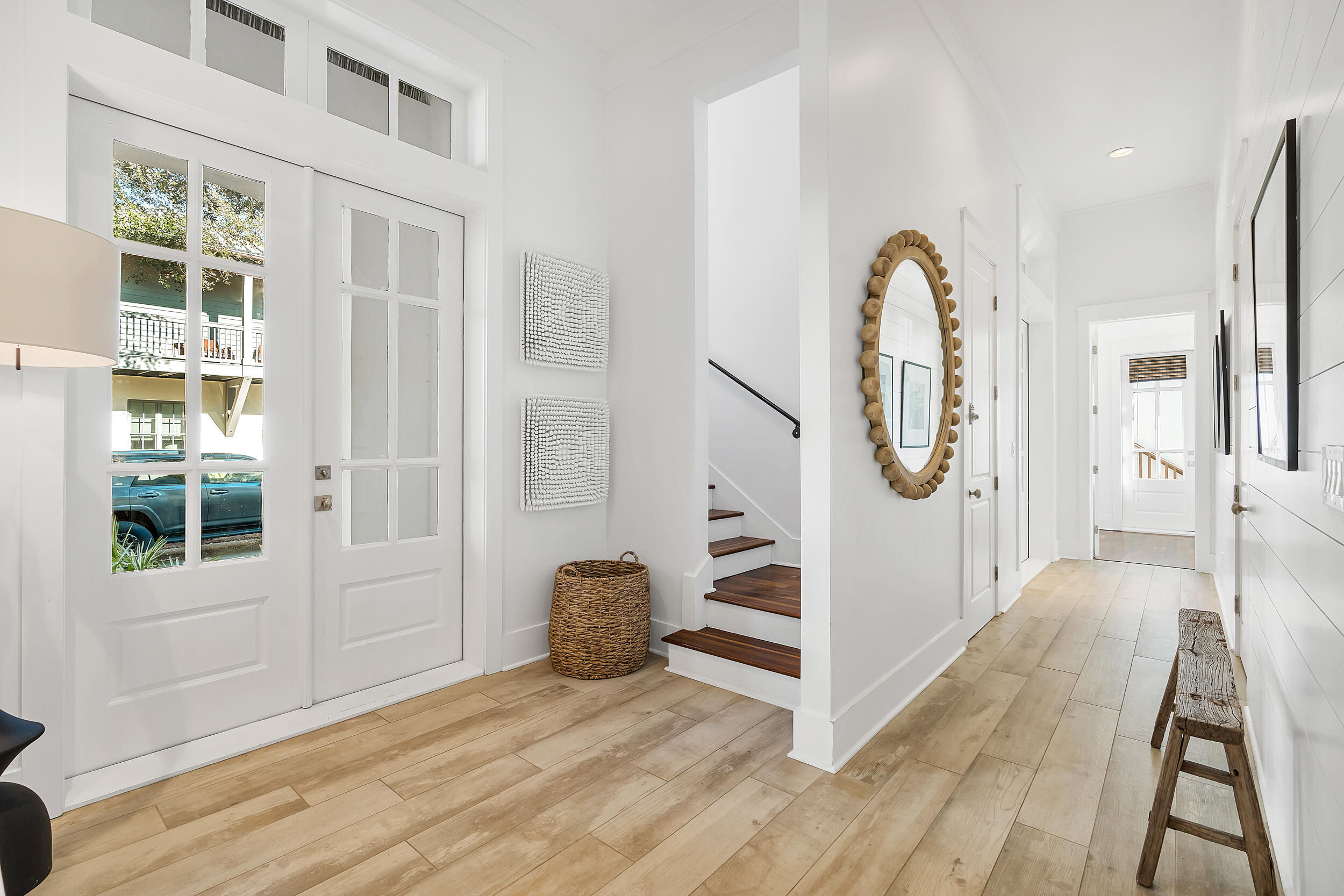 132 Kingston Road Rosemary Beach, FL 32461 - Photo 25 of 70 an entryway with wooden floor mirror and windows