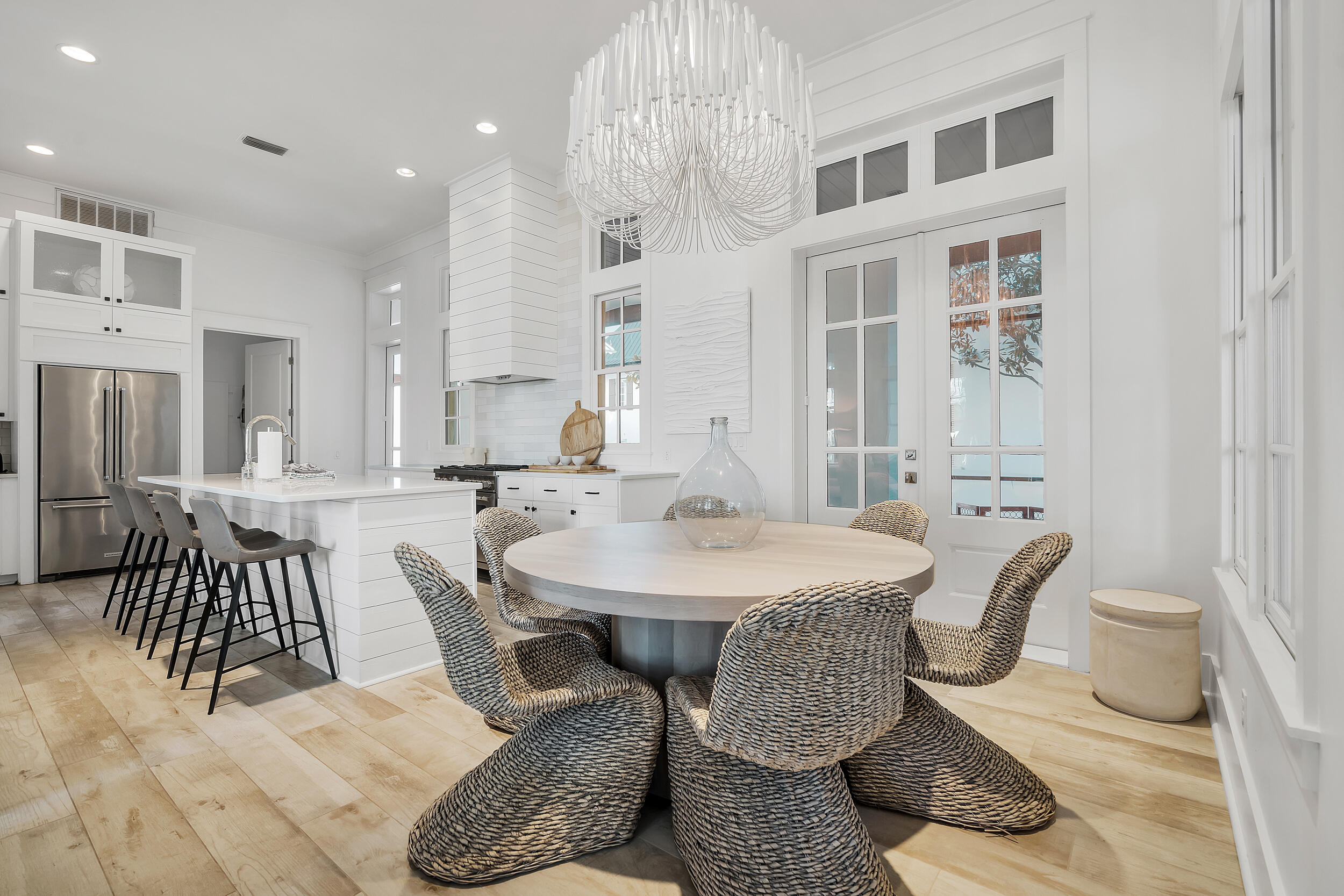 132 Kingston Road Rosemary Beach, FL 32461 - Photo 28 of 70 a living room with furniture a table and kitchen view